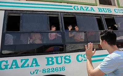 Palestinians wait to travel to Egypt through the Rafah border crossing in the southern Gaza Strip, on May 18, 2018. (AFP Photo/Said Khatib)