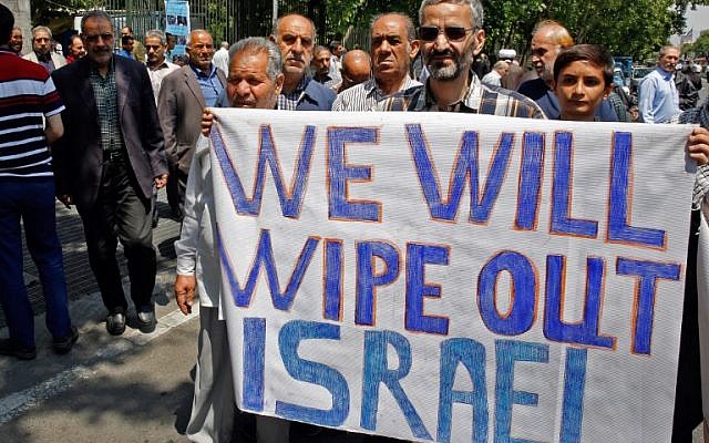 Iranians hold a banner with an anti-Israel message in the capital Tehran on May 18, 2018, as they take part in an anti-US and Israel demonstration after weekly Friday prayers. (AFP/Stringer) Iranians hold a banner with an anti-Israel message in the capital Tehran on May 18, 2018, as they take part in an anti-US and Israel demonstration after weekly Friday prayers. (AFP/Stringer)