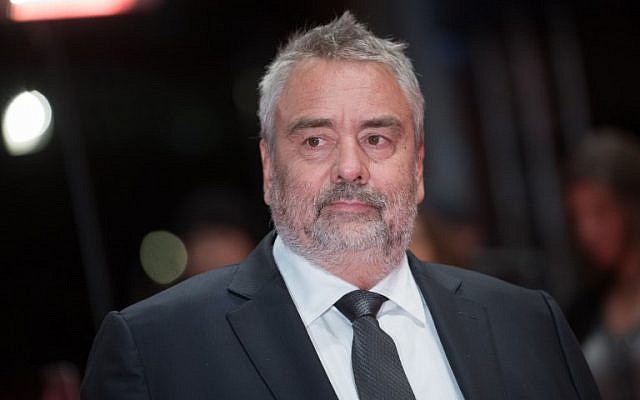 (FILES) In this file photo taken on February 17, 2018 French director Luc Besson poses on the red carpet upon arrival for the premiere of the film "Eva" presented in competition during the 68th Berlinale film festival in Berlin (AFP/ Stefanie Loos)