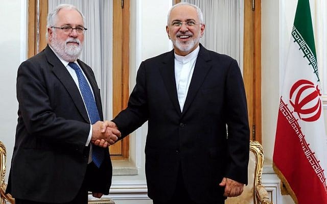 Iran's Foreign Minister Mohammad Javad Zarif (R) shakes hands with the EU's Climate Action and Energy Commissioner Miguel Arias Canete as they meet in the Iranian capital Tehran on May 20, 2018. (AFP Photo/Stringer) Iran's Foreign Minister Mohammad Javad Zarif (R) shakes hands with the EU's Climate Action and Energy Commissioner Miguel Arias Canete as they meet in the Iranian capital Tehran on May 20, 2018. (AFP Photo/Stringer)
