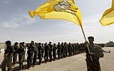 Members of the Syrian Democratic Forces (SDF), trained by the US-led coalition, participate in the graduation ceremony of their first regiment in al-Kasrah, a suburb of the eastern Syrian city of Deir Ezzor (also Deir El-Zour), on May 21, 2018. (AFP Photo/Delil Souleiman)