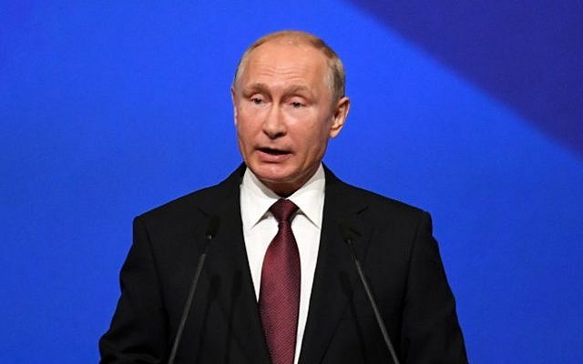 Russian President Vladimir Putin gives a speech at a session of the Saint Petersburg International Economic Forum on May 25, 2018, in Saint Petersburg, Russia. (AFP/Kirill Kudryavtsev)