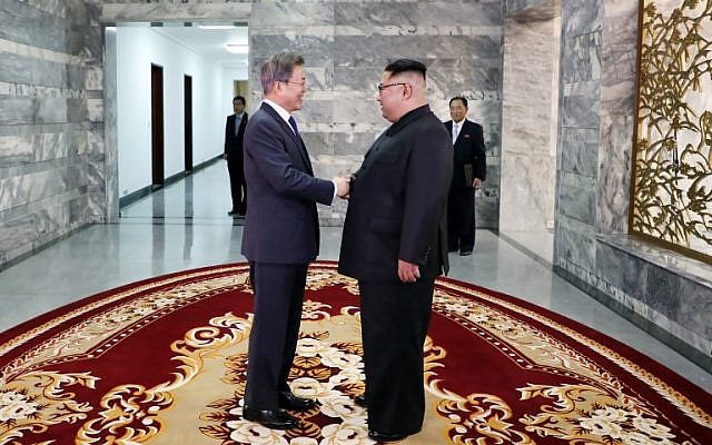 This picture taken on May 26, 2018 and released by the Blue House via Dong-A Ilbo shows South Korea's President Moon Jae-in , left, shaking hands with North Korea's leader Kim Jong Un before their second summit at the north side of the truce village of Panmunjom in the Demilitarized Zone (DMZ). (AFP/ Dong-A Ilbo / Handout) This picture taken on May 26, 2018 and released by the Blue House via Dong-A Ilbo shows South Korea's President Moon Jae-in , left, shaking hands with North Korea's leader Kim Jong Un before their second summit at the north side of the truce village of Panmunjom in the Demilitarized Zone (DMZ). (AFP/ Dong-A Ilbo / Handout)