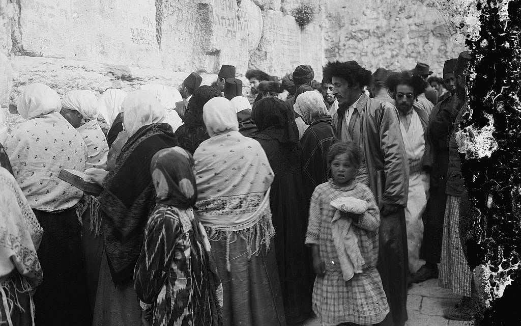 Men and women pray side by side at the Western Wall, ca. 1898-1946. (American Colony)