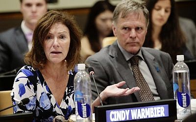 Fred Warmbier, right, listens as his wife Cindy Warmbier speaks of their son Otto Warmbier, an American who died last year, days after his release from captivity in North Korea during a meeting Thursday, May 3, 2018, at the United Nations headquarters. (AP/Frank Franklin II)