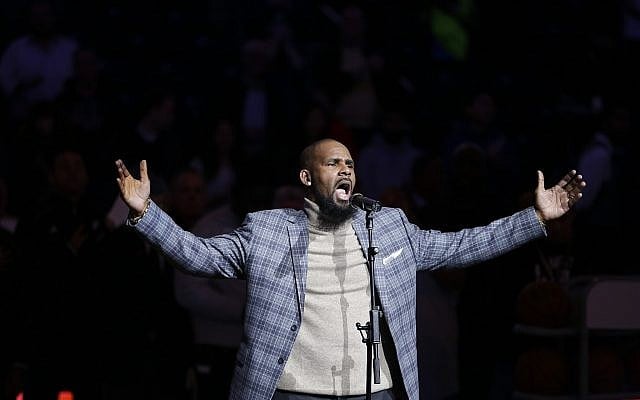 Musical artist R. Kelly performs the national anthem before an NBA basketball game between the Brooklyn Nets and the Atlanta Hawks in New York, November 17, 201 (AP Photo/Frank Franklin II, File) Musical artist R. Kelly performs the national anthem before an NBA basketball game between the Brooklyn Nets and the Atlanta Hawks in New York, November 17, 201 (AP Photo/Frank Franklin II, File)