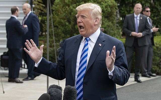 US President Donald Trump tells reporters a time and place for his meeting with North Korea's Kim Jong Un has been set and will be announced soon, as he leaves for Dallas to address the National Rifle Association, in Washington, Friday, May 4, 2018. (AP Photo/J. Scott Applewhite) US President Donald Trump tells reporters a time and place for his meeting with North Korea's Kim Jong Un has been set and will be announced soon, as he leaves for Dallas to address the National Rifle Association, in Washington, Friday, May 4, 2018. (AP Photo/J. Scott Applewhite)