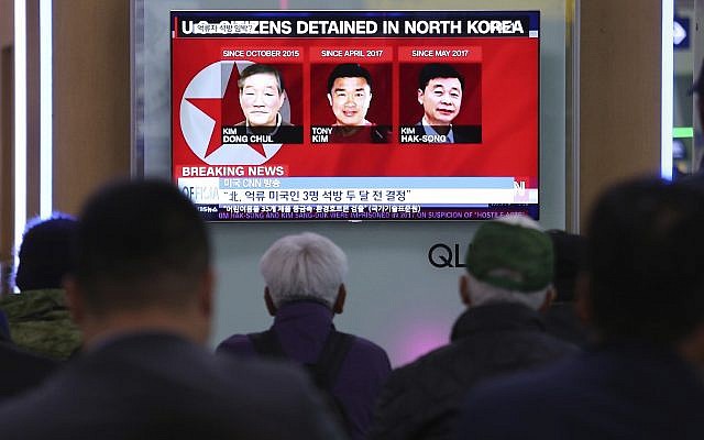 In this May 3, 2018 photo, people watch a TV news report screen showing portraits of three Americans, Kim Dong Chul, left, Tony Kim and Kim Hak Song, right, detained in the North Korea, at the Seoul Railway Station in Seoul, South Korea. (AP Photo/Ahn Young-joon) In this May 3, 2018 photo, people watch a TV news report screen showing portraits of three Americans, Kim Dong Chul, left, Tony Kim and Kim Hak Song, right, detained in the North Korea, at the Seoul Railway Station in Seoul, South Korea. (AP Photo/Ahn Young-joon)
