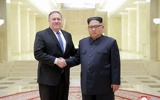 In this May 9, 2018, photo provided on May 10, 2018, by the North Korean government, US Secretary of State Mike Pompeo, left, poses with North Korean leader Kim Jong Un in Pyongyang, North Korea. (Korean Central News Agency/Korea News Service via AP) In this May 9, 2018, photo provided on May 10, 2018, by the North Korean government, US Secretary of State Mike Pompeo, left, poses with North Korean leader Kim Jong Un in Pyongyang, North Korea. (Korean Central News Agency/Korea News Service via AP)