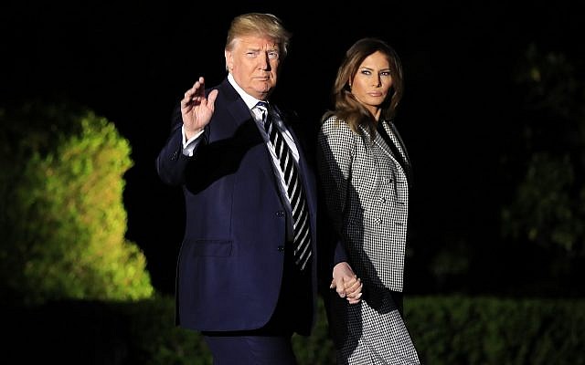 US President Donald Trump, with first lady Melania Trump, leaves the White House in Washington, early on May 10, 2018, to greet three freed Americans detained in North Korea for over a year, who were due to arrive at Joint Base Andrews, Md. (AP Photo/Manuel Balce Ceneta) US President Donald Trump, with first lady Melania Trump, leaves the White House in Washington, early on May 10, 2018, to greet three freed Americans detained in North Korea for over a year, who were due to arrive at Joint Base Andrews, Md. (AP Photo/Manuel Balce Ceneta)