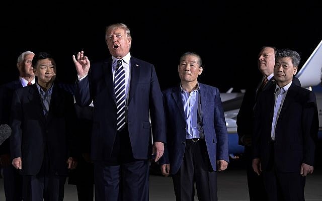 US President Donald Trump speaks as he stands with Tony Kim, second left, Kim Dong Chul, center right, and Kim Hak Song, right, three Americans detained in North Korea for more than a year, after they arrived at Andrews Air Force Base in Md., Thursday, May 10, 2018. Vice President Mike Pence, left, and Secretary of State Mike Pompeo, second from right, listen. (AP Photo/Susan Walsh) US President Donald Trump speaks as he stands with Tony Kim, second left, Kim Dong Chul, center right, and Kim Hak Song, right, three Americans detained in North Korea for more than a year, after they arrived at Andrews Air Force Base in Md., Thursday, May 10, 2018. Vice President Mike Pence, left, and Secretary of State Mike Pompeo, second from right, listen. (AP Photo/Susan Walsh)