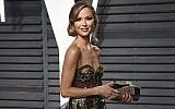 In this Feb. 26, 2017 file photo, fashion designer Georgina Chapman arrives at the Vanity Fair Oscar Party in Beverly Hills, Calif.  (Evan Agostini/Invision/AP)