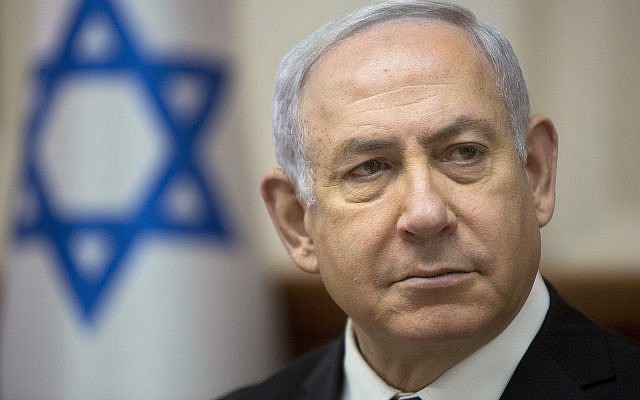 In this April 29, 2018 file photo, Israeli Prime Minister Benjamin Netanyahu arrives for a weekly cabinet meeting at the Prime Minister's Office in Jerusalem. (AP/Sebastian Scheiner) In this April 29, 2018 file photo, Israeli Prime Minister Benjamin Netanyahu arrives for a weekly cabinet meeting at the Prime Minister's Office in Jerusalem. (AP/Sebastian Scheiner)