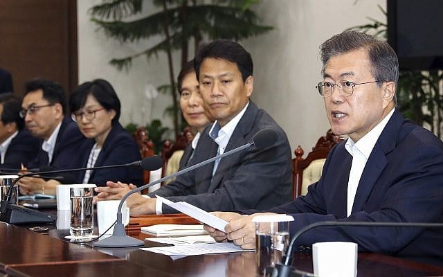 South Korean President Moon Jae-in, right, talks during a meeting with his senior aides at the presidential Blue House in Seoul, South Korea, May 14, 2018. (Bee Jae-man/Yonhap via AP) South Korean President Moon Jae-in, right, talks during a meeting with his senior aides at the presidential Blue House in Seoul, South Korea, May 14, 2018. (Bee Jae-man/Yonhap via AP)