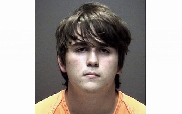 This photo provided by the Galveston County Sheriff's Office shows Dimitrios Pagourtzis, who law enforcement officials took into custody Friday, May 18, 2018, and identified as the suspect in the deadly school shooting in Santa Fe, Texas, near Houston. (Galveston County Sheriff's Office via AP) This photo provided by the Galveston County Sheriff's Office shows Dimitrios Pagourtzis, who law enforcement officials took into custody Friday, May 18, 2018, and identified as the suspect in the deadly school shooting in Santa Fe, Texas, near Houston. (Galveston County Sheriff's Office via AP)