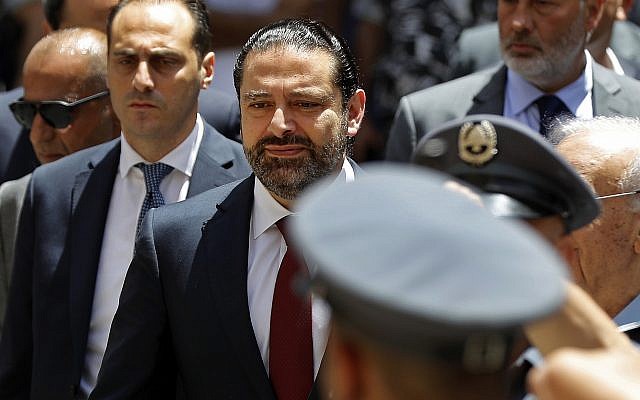 Outgoing Lebanese Prime Minister Saad Hariri, center, arrives to parliament to attend a session for the election of the house speaker, in Beirut, Lebanon, Wednesday, May 23, 2018. (AP Photo/Hussein Malla) Outgoing Lebanese Prime Minister Saad Hariri, center, arrives to parliament to attend a session for the election of the house speaker, in Beirut, Lebanon, Wednesday, May 23, 2018. (AP Photo/Hussein Malla)
