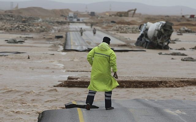 An Omani civil defense member visits a road which has been cut by floodwaters after Cyclone Merkunu in Salalah, Oman, Saturday, May 26, 2018. (AP Photo/Kamran Jebreili) An Omani civil defense member visits a road which has been cut by floodwaters after Cyclone Merkunu in Salalah, Oman, Saturday, May 26, 2018. (AP Photo/Kamran Jebreili)