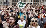 People from the "Yes" campaign react as the results of the Irish referendum on the 8th Amendment of the Irish Constitution are heard, at Dublin Castle, in Dublin, Ireland, on May 26, 2018. (AP Photo/Peter Morrison)