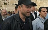 Roman Abramovich, Russian oil billionaire and owner of English FA Premier League's Chelsea Football Club, walks at the Western Wall plaza in Jerusalem's Old City Tuesday Feb. 7, 2006. (AP)