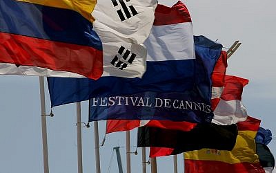 Illustrative: A Cannes Film Festival flag is seen in front of the Cannes Film Festival Palace , in Cannes, Tuesday, May 15, 2007. (AP Photo/Kirsty Wigglesworth)