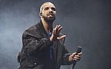 In this October 8, 2016 photo, Drake performs onstage in Toronto. (Photo by Arthur Mola/Invision/AP)