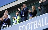 Chelsea FC owner Roman Abramovich, center, applauds at the end of the English Premier League soccer match between Chelsea and Sunderland at Stamford Bridge stadium in London, Sunday, May 21, 2017. (Kirsty Wigglesworth/AP)