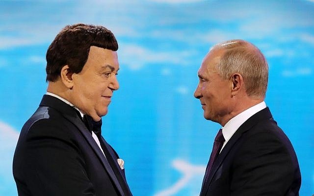 Russian President Vladimir Putin, right, congratulates popular Russian singer Iosif Kobzon before the gala to mark Kobzon's 80th birthday at the State Kremlin Palace in Moscow, Russia, September 20, 2017. (Mikhail Klimentyev, Sputnik, Kremlin Pool Photo via AP) Russian President Vladimir Putin, right, congratulates popular Russian singer Iosif Kobzon before the gala to mark Kobzon's 80th birthday at the State Kremlin Palace in Moscow, Russia, September 20, 2017. (Mikhail Klimentyev, Sputnik, Kremlin Pool Photo via AP)