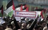Thousands of employees of the U.N agency for Palestinian refugees demonstrate in support of their organization following US funding cuts in Gaza City, Monday, Jan. 29, 2018. (AP Photo/ Khalil Hamra)