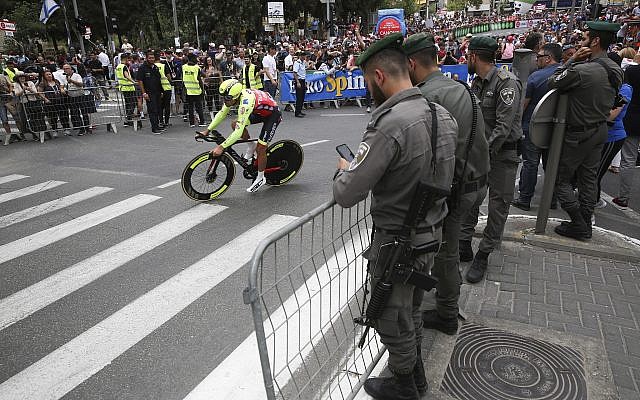 A cyclist in action during time trials at the opening of Giro d'Italia, Tour of Italy, cycling race in Jerusalem, Friday, May 4, 2018. (AP Photo/Oded Balilty)