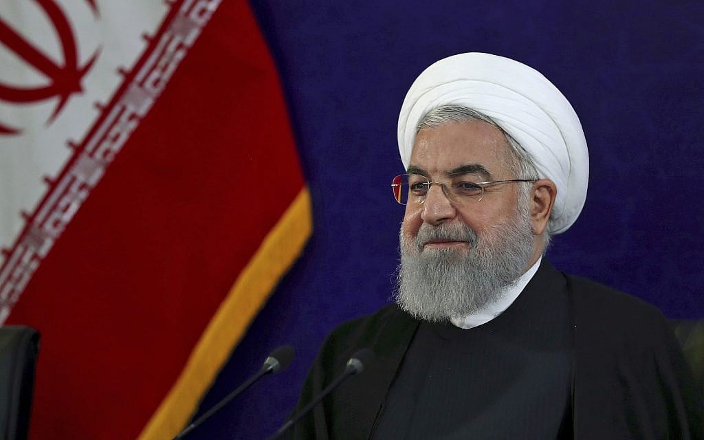 President Hassan Rouhani attends a meeting with officials and industrialists, at a petroleum conference in Tehran, Iran, May 8, 2018. (Iranian Presidency Office via AP)
