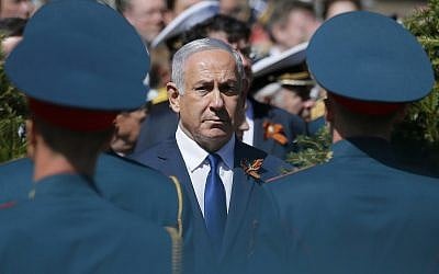 Israeli Prime Minister Benjamin Netanyahu attends a wreath-laying ceremony at the Tomb of the Unknown Soldier after the Victory Parade marking the 73th anniversary of the defeat of the Nazis in World War II, in Moscow, Russia, May 9, 2018. (AP Photo/Alexander Zemlianichenko)