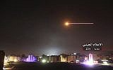 Illustrative: Anti-aircraft fire rises into the sky as Israeli missiles hit air defense positions and other military bases around Damascus, Syria, on May 10, 2018, following what the Israeli military said was an Iranian barrage of rockets against Israeli bases on the Golan Heights. (Syrian Central Military Media, via AP/ File)