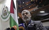 Yahya Sinwar, the Hamas leader in the Gaza Strip, speaks to foreign correspondents in his office in Gaza City, May 10, 2018. (Khalil Hamra/AP)
