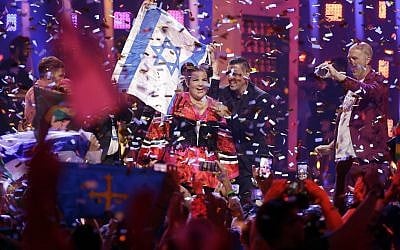 Netta Barzilai celebrates after winning the Eurovision Song Contest grand final in Lisbon, Portugal, May 12, 2018. (AP Photo/Armando Franca)