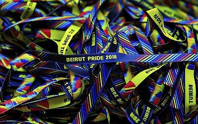In this picture taken Saturday, May 12, 2018, bracelets decorated with the rainbow colors are displayed at a restaurant during the launch event of Beirut Pride week in Beirut, Lebanon (AP Photo/Hassan Ammar)