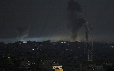 Illustrative: Smoke rises following Israeli strikes on Gaza City, May 30, 2018. (AP Photo/Adel Hana)