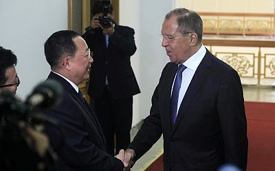 North Korean Foreign Minister Ri Yong Ho  (left) shakes hands with Russian Foreign Minister Sergei Lavrov at the Mansudae Assembly Hall, May 31, 2018, in Pyongyang, North Korea. (AP Photo/Jon Chol Jin)