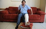 Arab Israeli NGO worker Jafar Farah, who alleges a police officer broke his knee after he was arrested. (Screen capture: Twitter)