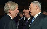 Prime Minister Benjamin Netanyahu, right, seen with outgoing Mossad chief Tamir Pardo during a farewell ceremony in Tel Aviv on January 5, 2015. (Kobi Gideon/GPO)
