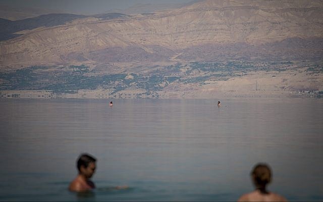 Illustrative image of people floating on the water in the Dead Sea, Israel, on May 27, 2017. (Yonatan Sindel/Flash90) Illustrative image of people floating on the water in the Dead Sea, Israel, on May 27, 2017. (Yonatan Sindel/Flash90)
