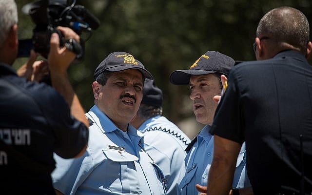 File: Police Commissioner Roni Alsheich (2nd-L) and Jerusalem police chief Yoram Halevy (2nd-R) seen during a briefing at Damascus Gate in Jerusalem's Old City, on June 18, 2017. (Hadas Parush/Flash90) File: Police Commissioner Roni Alsheich (2nd-L) and Jerusalem police chief Yoram Halevy (2nd-R) seen during a briefing at Damascus Gate in Jerusalem's Old City, on June 18, 2017. (Hadas Parush/Flash90)