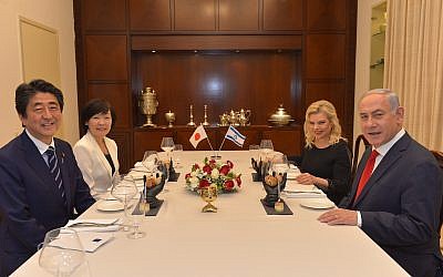 Prime Minister Benjamin Netanyahu (right) and his wife Sara Netanyahu host a dinner for Japanese Prime Minister Shinzo Abe and his wife Akie, at the Prime Minister's Residence in Jerusalem on May 2, 2018. (Kobi Gideon/GPO)