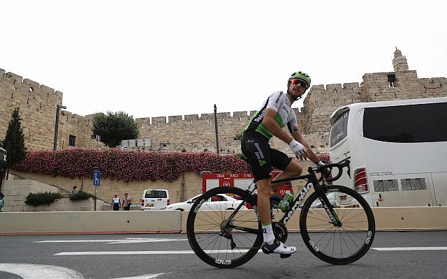 Cyclists train near the Tower of David in Jerusalem's Old City on May 4, 2018, ahead of the opening of the Giro d'Italia competition. (Yonatan Sindel/Flash90)