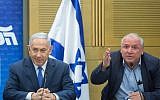 Prime Minister Benjamin Netanyahu, left, with coalition head Likud MK David Amsalem at a Likud party faction meeting in the Knesset on May 21, 2018. (Miriam Alster/Flash90)