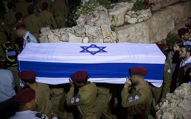 Soldiers carry the coffin of their comrade Ronen Lubarsky during his funeral at the Mount Herzl Military Cemetery in Jerusalem, on May 27, 2018 (Yonatan Sindel/Flash90) Soldiers carry the coffin of their comrade Ronen Lubarsky during his funeral at the Mount Herzl Military Cemetery in Jerusalem, on May 27, 2018 (Yonatan Sindel/Flash90)