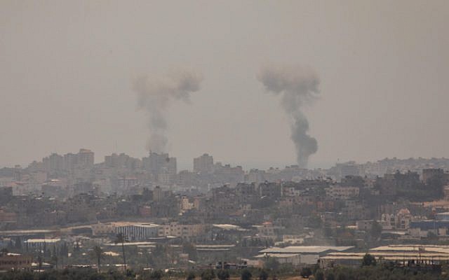 Smoke rises following Israeli strikes in the Gaza Strip, as seen from the Israeli side of the border on May 29, 2018 (Yonatan Sindel/Flash90) Smoke rises following Israeli strikes in the Gaza Strip, as seen from the Israeli side of the border on May 29, 2018 (Yonatan Sindel/Flash90)