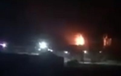 A still from a video claiming to show part of the Gaza seaport on fire. (screen capture: Twitter)