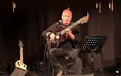 David Broza singing at the May 1, 2018 Times of Israel Presents event at Beit Avi Chai (Jessica Steinberg/Times of Israel)