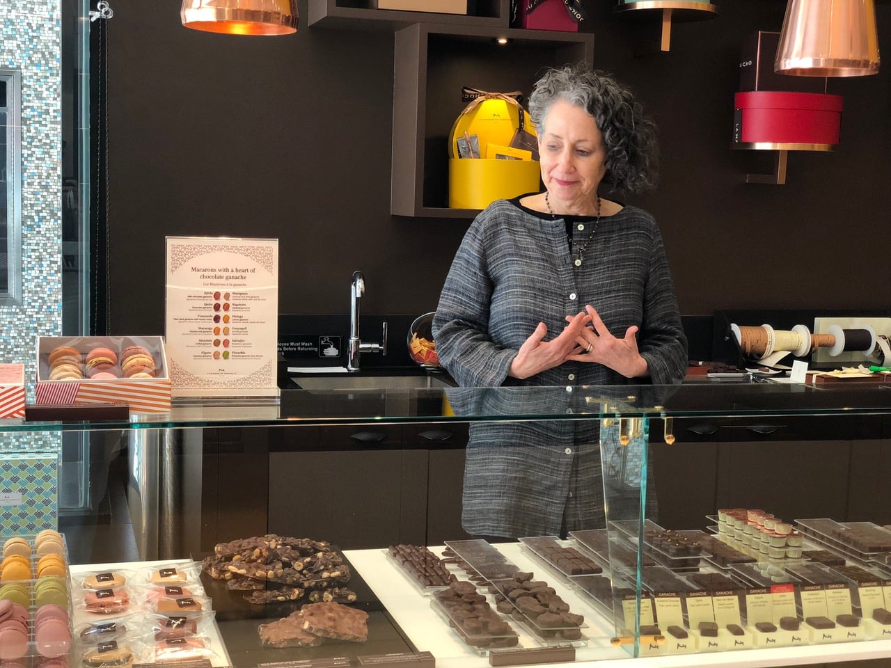 Rabbi Deborah Prinz points on front of a display of different chocolates at La Maison du Chocolat, perhaps the holiest site for cocoa lovers on the Upper East Side (Danielle Ziri/ Times of Israel) Rabbi Deborah Prinz points on front of a display of different chocolates at La Maison du Chocolat, perhaps the holiest site for cocoa lovers on the Upper East Side (Danielle Ziri/ Times of Israel)