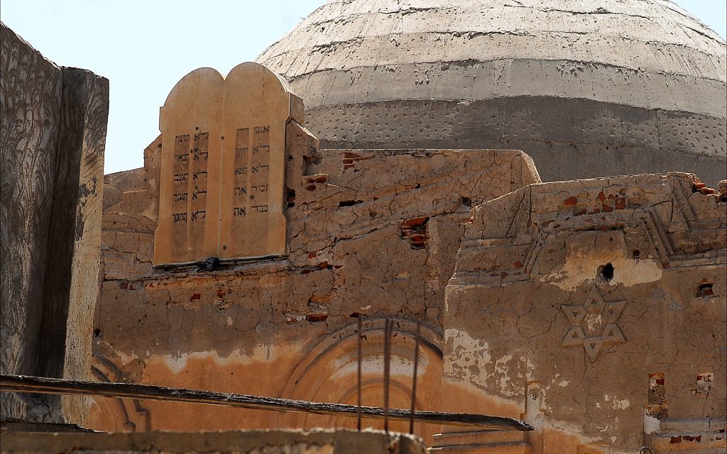 The Ten Commandments, engraved in Hebrew, and a faded Star of David are the only traces of Judaica left of the once-elegant Tripoli Synagogue — the spiritual home to thousands of Libyan Jews until its destruction in the wake of the Six-Day War in 1967. (Larry Luxner/ Times of Israel)